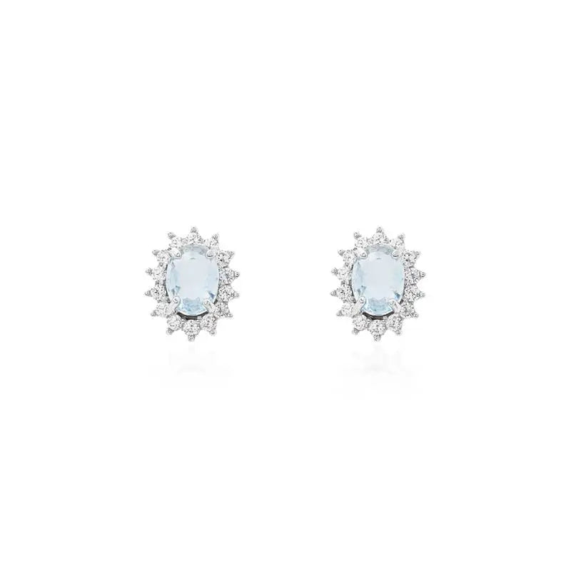 08 MM OVAL EARRING WITH PRINCESS SETTING AROUND RHODIUM/AQUAMARINE/WHITE ZIRCONIA
