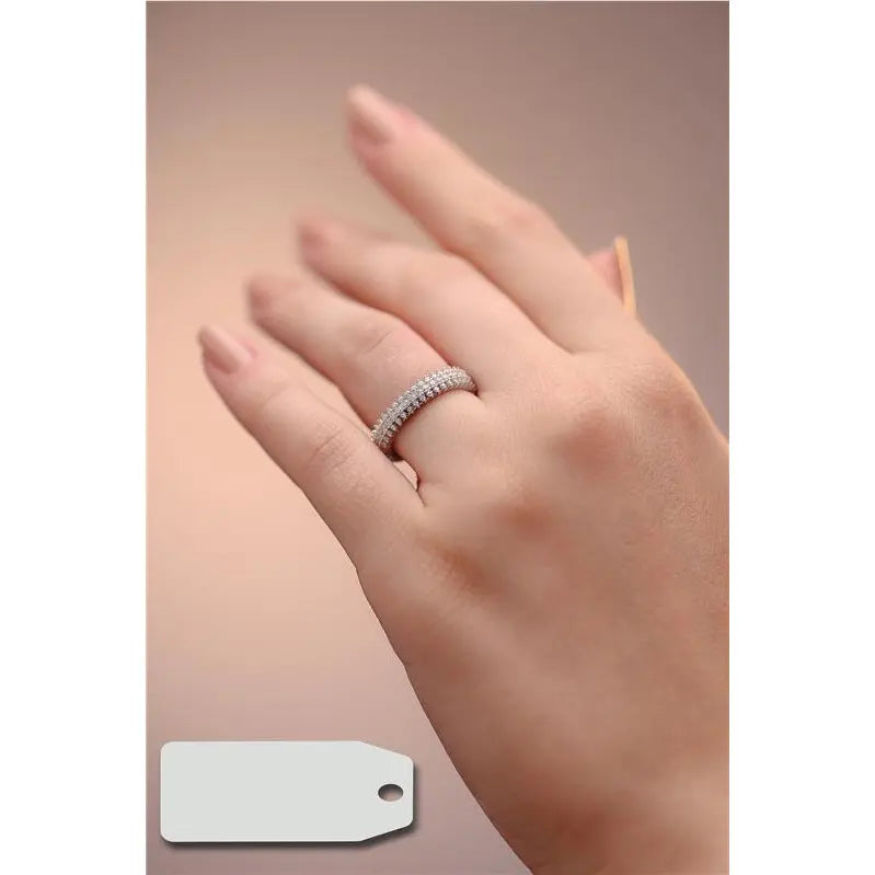 ONE LARGER ROW STUDDED IN THE MIDDLE AND TWO LARGER ON THE SIDE RHODIUM/NO STONE/WHITE ZIRCONIA