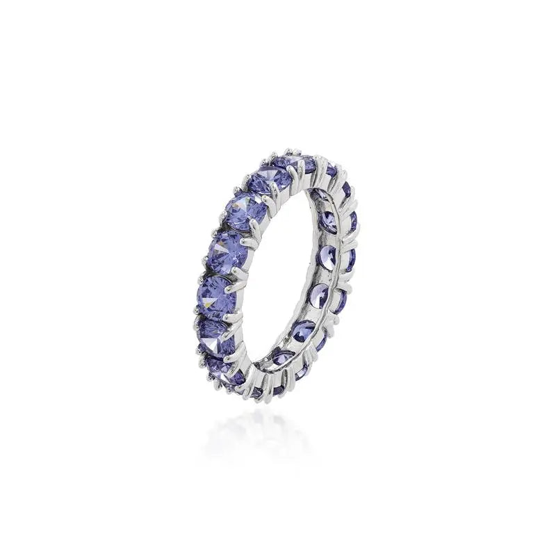 FULL WEDDING RING WITH POINTS OF LIGHT 4 MM FOUR CLAWS RHODIUM/TANZANITE/SMOOTH