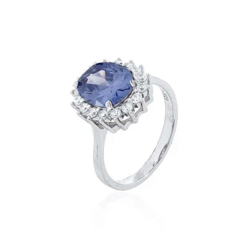 8 MM OVAL RING WITH PRINCESS SETTING AROUND RHODIUM/TANZANITE/WHITE ZIRCONIA