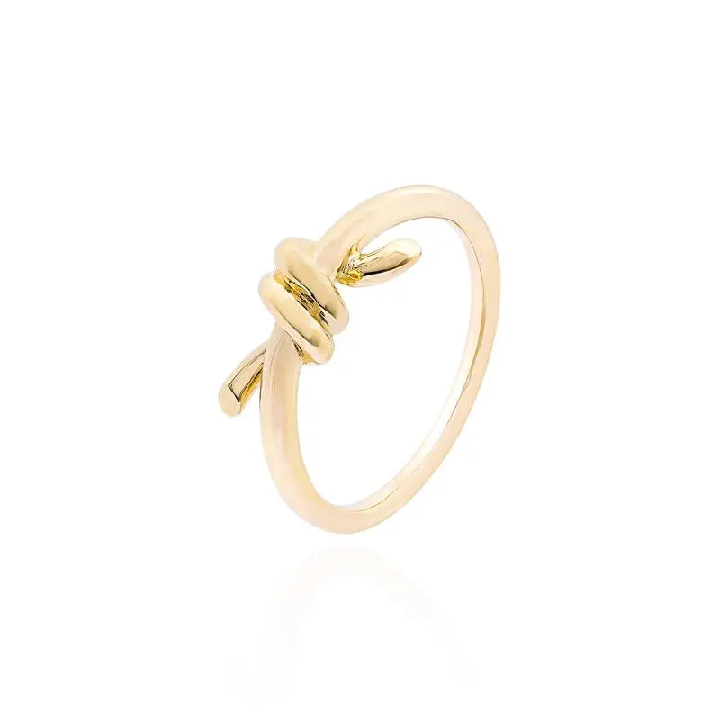 PLAIN RING WITH CENTRAL KNOT GOLD/WITHOUT STONE/PLAIN