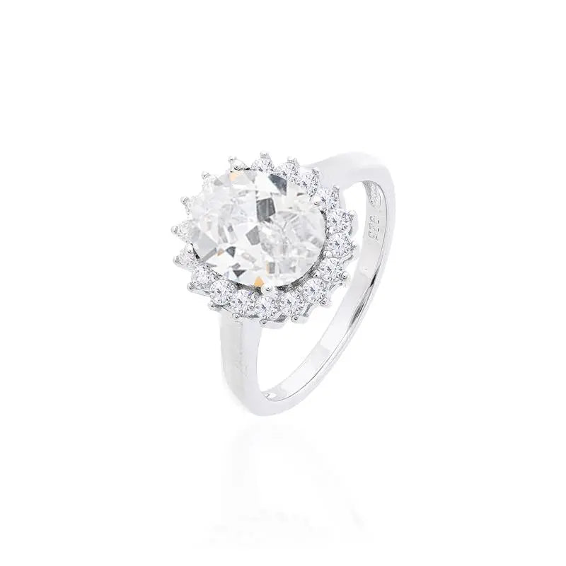 8 MM OVAL SMOOTH RING WITH PRINCESS SETTING AROUND RHODIUM/CRYSTAL/WHITE ZIRCONIA